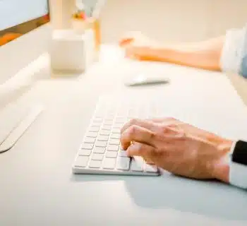 person using iMac